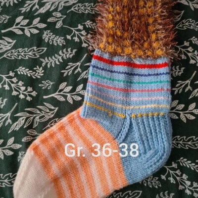 „Die Socken meiner Mutter“ mit Sorgfalt gefertigt, ein Beweis ihrer Arbeit und ihrer Liebe zur Qualität