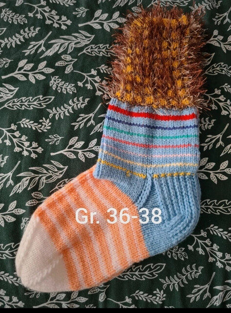 „Die Socken meiner Mutter“ mit Sorgfalt gefertigt, ein Beweis ihrer Arbeit und ihrer Liebe zur Qualität